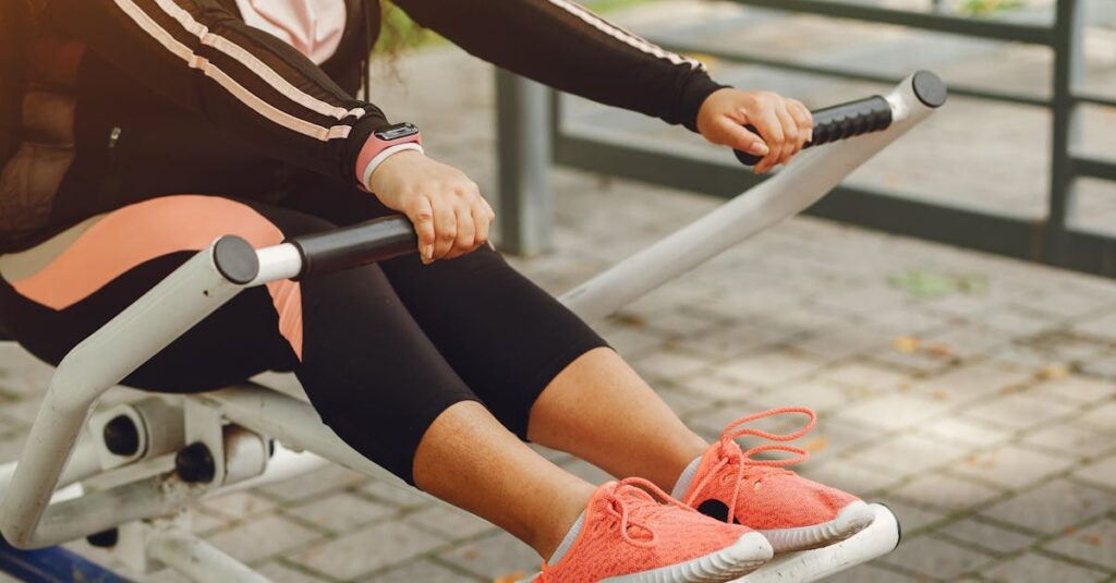 pexels-photo-4971005-4971005 A woman in sportswear works out on outdoor fitness equipment, focusing on health and recreation.